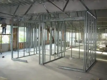 A room being built with metal framing in the center.