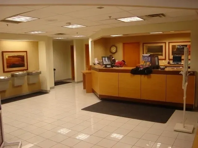 A lobby with a desk and a counter